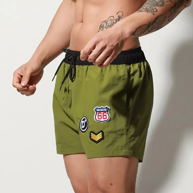 Shiny Badge Swim Shorts